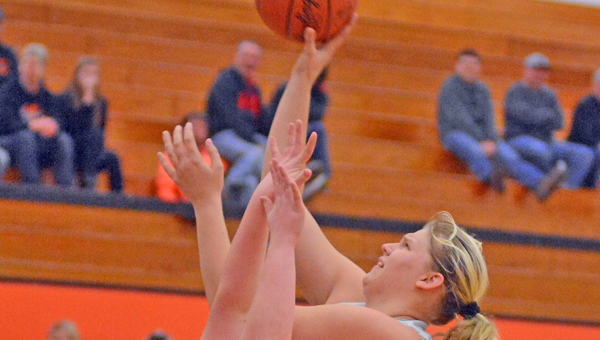 Fairland Lady Dragons’ senior center Terra Stapleton scores two of her 29 points in a 62-37 win over Alexander Saturday in the Div. III district championship game. (Kent Sanborn of Southern Ohio Sports Photos)