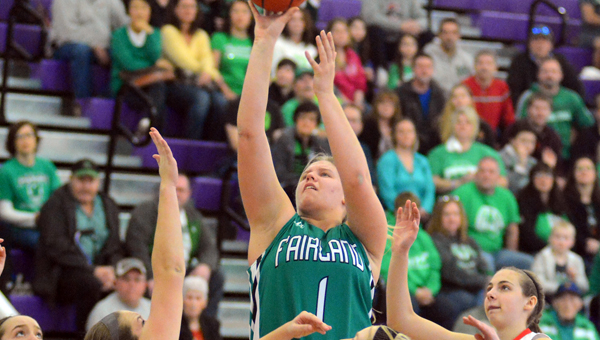 Fairland Lady Dragons’ Terra Stapleton (1) draws a crowd of Sugarcreek Garaway defenders as she scores two of her 24 points in Saturday’s Division III regional championship game. Fairland won 52-46 to earn a trip to the state tournament on Friday. (Kent Sanborn of Southern Ohio Sports Photos)