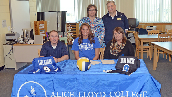South Point Lady Pointers’ senior Lakin Adams signed a letter-of-intent to play volleyball at Alice Lloyd College. Attending the ceremony were: seated from left to right, South Point head coach Allen Perry, Lakin, and Alice Lloyd assistant coach Jolene Watts; standing from left to right, parents Angie and Dave Adams. (Kent Sanborn of Southern Ohio Sports Photos)