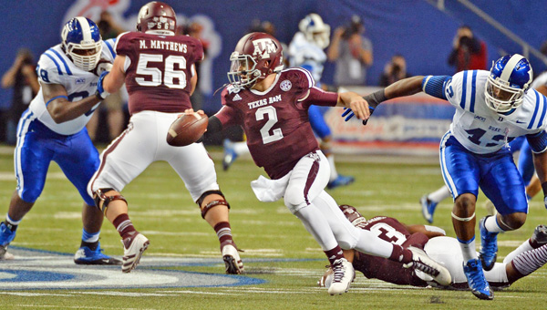 Texas A&M quarterback Johnny Manziel (2) was taken in the first round by the Cleveland Browns with the No. 22 pick. (MCT Direct Photo)