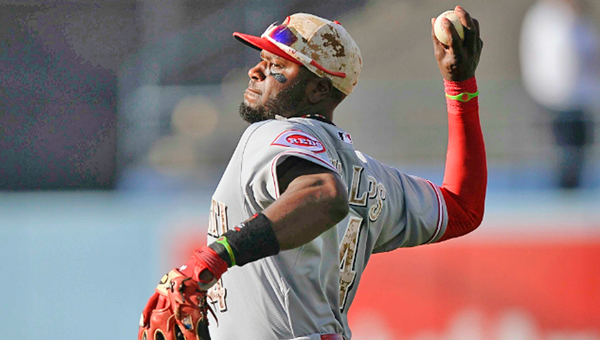 Cincinnati Reds’ second baseman throws out a runner during Monday’s game against the Los Angeles Dodgers. LA pitcher Hyun-Jin Nyu had a perfect game through seven innings before the Reds scored three runs in the eighth but left the bases loaded in a 4-3 loss. (Photo Courtesy of The Cincinnati Reds)