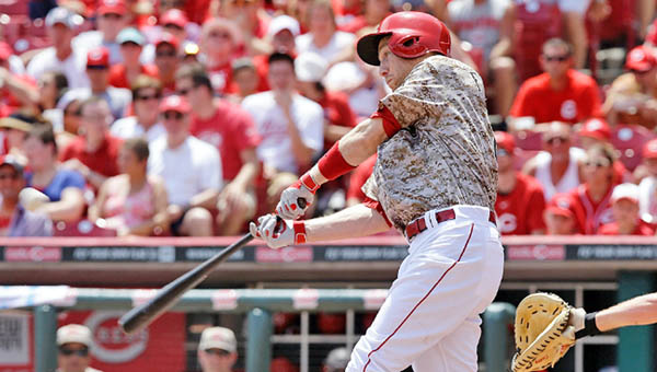 Cincinnati third baseman Todd Frazier connects for a two-run homer in the fifth inning that helped give the Reds a 4-3 win over the Toronto Blue Jays on Sunday. It was Frazier’s 17th home run of the season. (Courtesy of The Cincinnati Reds.com)