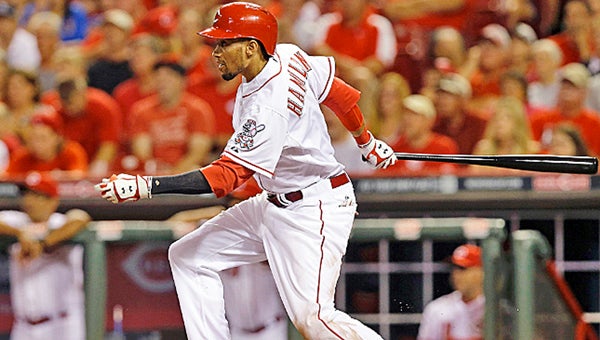 Cincinnati rookie outfielder Billy Hamilton singles home a run in the fifth inning. Hamilton drove in a career-high four runs as the Reds beat the Chicago Cubs 9-3 Monday. (Courtesy of the Cincinnati Reds.com)