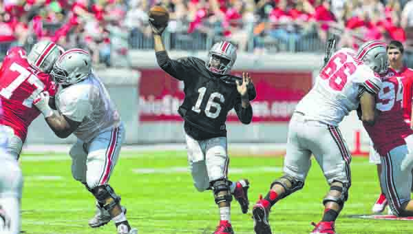 Redshirt freshman quarterback J.T. Barrett will be the main focus as the Ohio State Buckeyes open the season at Navy on Saturday. Barrett takes over for injured starter Braxton Miller who is out for the season.