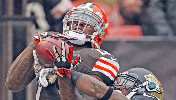 Cleveland wide receiver Josh Gordon, left, grabs a 21-yard touchdown pass in front of Jacksonville cornerback Will Blackmon during a game last season. Gordon was suspended Wednesday by the NFL for the entire 2014 season. (MCT Direct Photo)