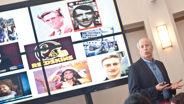 Keynote speaker Howard J. Ross speaks to eventgoers during the conference on Diversity and Inclusion Friday at Ohio University Southern.