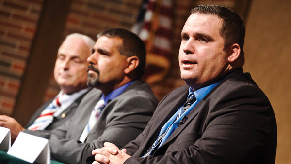 Josh Bailey, Thomas Jefferson Davis and Rep. Terry Johnson, pictured right to left, introduce themselves at the Candidate’s Forum Tuesday at Ohio University Southern.