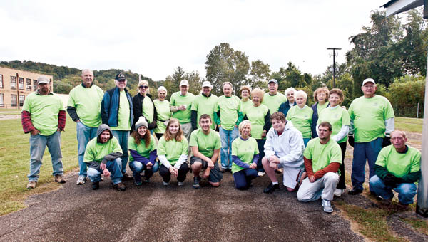 Volunteers gathered behind the Chesapeake Community Center before setting out for the Operation TLC event Saturday.