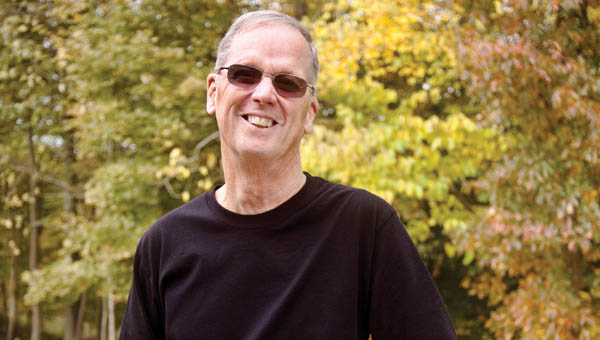THE TRIBUNE/JESSICA ST JAMES Lawrence County resident and polio survivor John Boyd stands on his back porch of his home in Upper Township.