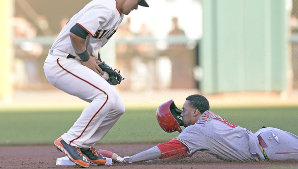 Cincinnati Reds’ outfielder Billy Hamilton (right) steals second base during a game at San Francisco this past season. Hamilton was second in the voting for the National League Rookie of the Year behind New York Mets’ pitcher Jacob deGrom. (MCT Direct Photos)