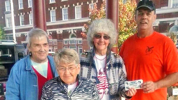 Larry Mader, far right, was the winner of 100 Ironton Bucks given away by the senior craft store. Pictured with Mader is and Judy Mills, Bonnie Fitzpatrick and Dot Collins of the senior craft store.
