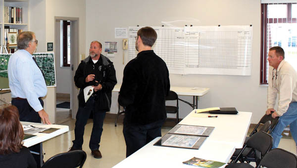 The Tribune/Dustin Melchior A public meeting about a proposed shared walking and bike trail on the Ironton riverfront was attended by many residents who asked questions and shared ideas. Construction on this phase of the trail should begin in July of 2015.