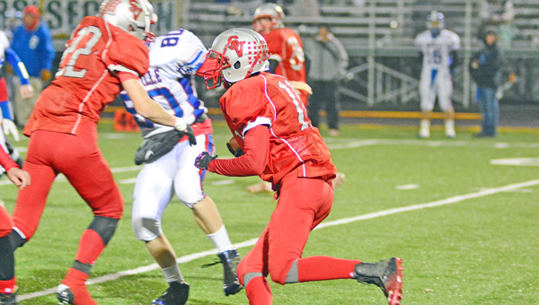 Symmes Valley Vikings’ Dillon McFann (11) runs behind a block by teammate Collin Webb (22) as he gains yardage in last week’s game against Danville. The Vikings play at Trimble Saturday at 7 p.m. in the Division VII Region 25 quarterfinals. (Kent Sanborn of Southern Ohio Sports Photos)