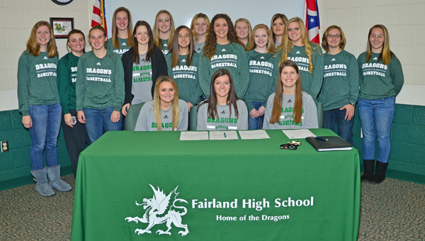 Fairland Lady Dragons’ senior basketball guard Caitlin Stone signed a letter-of-intent to play at Urbana University. Stone was joined by her teammates to celebrate the signing ceremony. Stone, seated in the center, is surrounded by her teammates who include: Mackenzie Riley, Kelsey Riley, Jenna Fulks, Whitney Huff, Sarah Warnock, Taylor Staten, Donyele Edwards, Maddy Kazee, Issy McKinney, Nicole Wagner, Emily Chapman, Taylar Wilson, Morgan Fridley and Alesha Simpson. (Kent Sanborn of Southern Ohio Sports Photos)