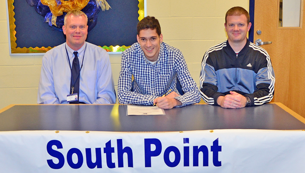 South Point Pointers’ senior Matt Krivan (center) signs a letter-of-intent to play soccer at Shawnee State University. Attending the signing ceremony were his sponsor Bill Christian (left) and Pointers’ head soccer coach Zane Joy (right). (Kent Sanborn of Southern Ohio Sports Photos)