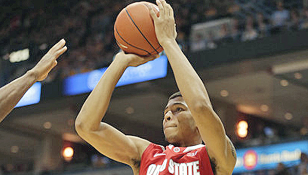 Ohio State Buckeyes’ Marc Loving hits a jumper for two of his 13 points. Loving helped an early second half rally but fouled out as the Buckeyes lost to Louisville 64-55 on Tuesday. (MCT Direct Photo)