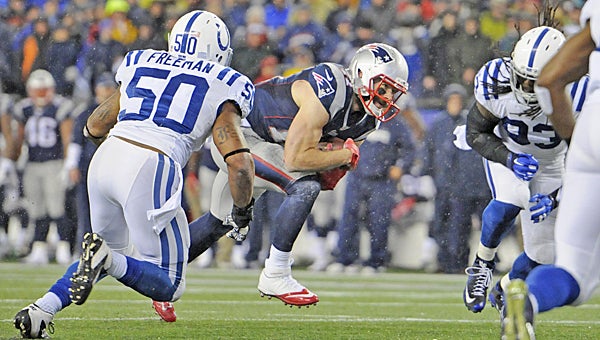 New England Patriots fullback James Develin (46) scores the second touchdown for New England during the first half on Sunday during a 45-7 romp over the Indianapolis Colts in the AFC championship game. New England will play Seattle in the Super Bowl on Feb. 1. (MCT Direct Photos)