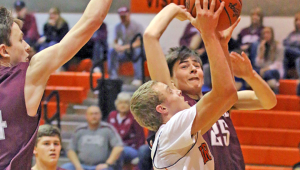 Ironton FIghting Tigers’ Phillip Kratzenberg (4) drives for a layup as he scores two of his career-high 23 points in a 91-68 win over Ashland on Saturday. Kratzenberg hit six 3-pointers in the win. Ironton hosts Portsmouth on Tuesday. (Courtesy of Tim Gearhart of Tim’s News & Novelties of Ironton)