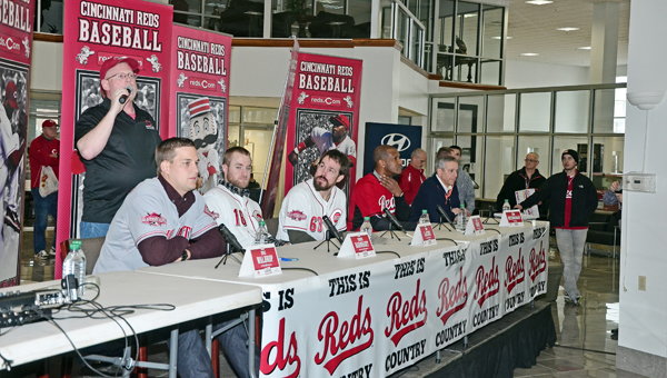 Members of the Cincinnati Reds who were part of the East Tour that appeared at Fannin Motors in Ashland, Ky., on Saturday included: from left to right, minor league outfielder Kyle Waldrop, catcher Tucker Barnhart, relief pitcher Sam LeCure, Reds’ Hall of Fame outfielder Eric Davis and announcer Thom Brennaman. (Kent Sanborn of Southern Ohio Sports Photos)