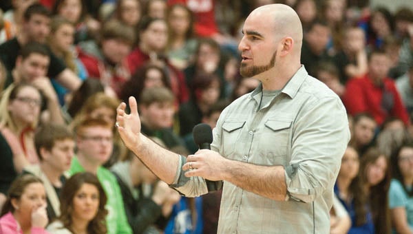 Youth motivational speaker Joel Penton addresses students at Dawson-Bryant High School on Thursday during a special assembly.