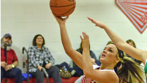 Symmes Valley Lady Vikings’ Meranda Hayes (13) scored 20 points on Tuesday in the Division IV sectional tournament. The Lady Vikings beat South Gallia 43-29. (Robert S. Stevens & The Gold Studio of Ironton)
