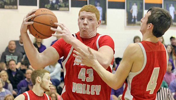 Symmes Valley Vikings’ Matt Rutt grabs a defensive rebound. The Vikings fell to South Webster 67-54 Tuesday in the Division IV sectional tournament. (Courtesy of Tim Gearhart of Tim’s News & Novelties of Ironton)