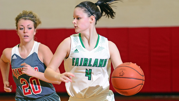 Fairland Lady Dragons’ senior point guard Taylor Staten (4) brings the ball up the court against Minford in Sunday’s Division III sectional tournament game. Fairland won 51-39. (Kent Sanborn of Southern Ohio Sports Photos)