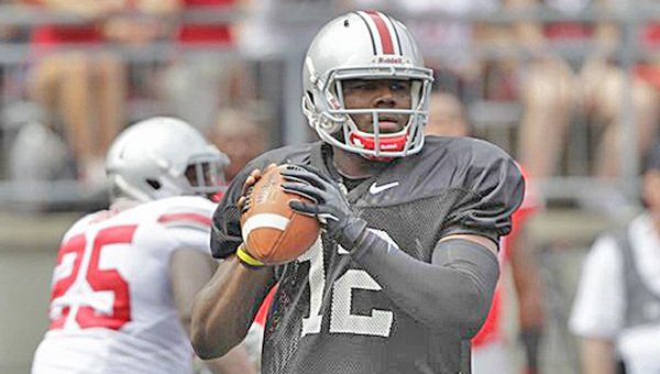Ohio State quarterback Cardale Jones looks for an open receiver during Saturday’s Scarlet-Gray spring game. Jones had two touchdown passes as the Gray won 17-14. (Courtesy of the Ohio State University)