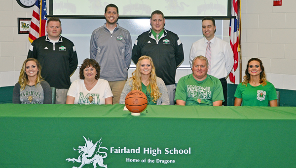 Fairland Lady Dragons’ senior Kelsey Riley signed to play basketball at Marshall University. Attending the ceremony were: seated from left to right, sister Carley Riley, mother Barbara Riley, Kelsey, father Scott Riley and sister Kara Riley; standing from left to right, Fairland head coach Jon Buchanan, assistant coach Adam Alt, athletic director Jeff Gorby and principal Chad Belville. (Kent Sanborn of Southern Ohio Sports Photos)
