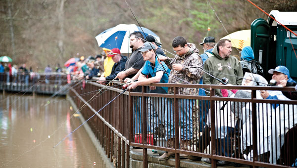Area residents and visitors gathered on the boardwalk at Lake Vesuvius to take part in the annual Wheelin’ Sportsmen Fishing event on Thursday.