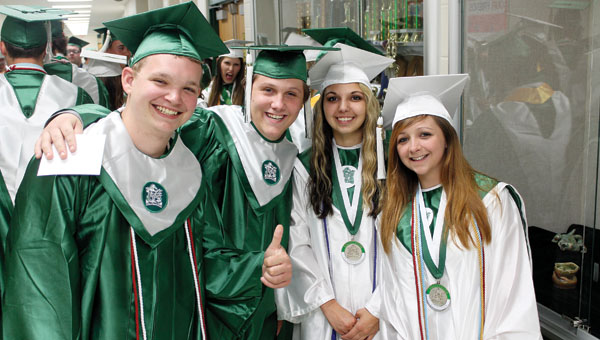 Fairland High School graduates Austin McKinney, Kayin Webb, Breahna Stirling and Jenny Mead before graduation Friday evening at Fairland High School.