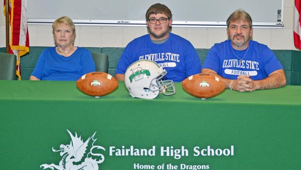 Fairland Dragons’ senior lineman Zach McKinney signed a letter-of-intent with Glenville State on Tuesday. Attending the ceremony were, from left to right, grandmother Brenda McKinney, Zach, and father J.C. McKinney. (Kent Sanborn of Southern Ohio Sports Photos)