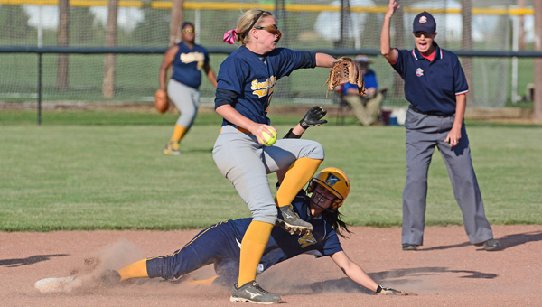 South Point Lady Pointers’ shortstop Haley Rawlins avoids the sliding runner after getting a force out at second base. The Lady Pointers beat Wellston 8-3 on Tuesday in the Division III district semifinals. (Kent Sanborn of Southern Ohio Sports Photos)