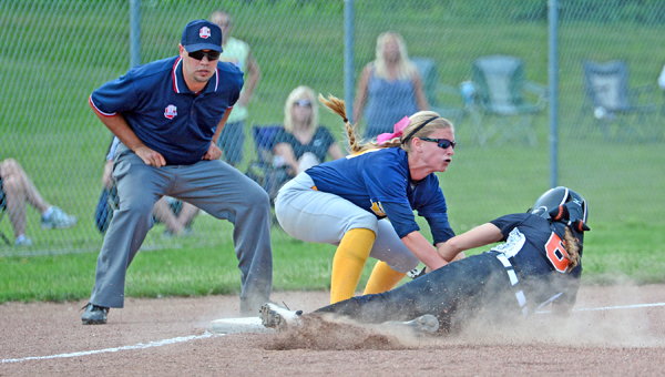 South Point Lady Pointers' shortstop Haley Rawlins (left) tags out a Portsmouth West runner sliding into third base during Thursday's Division III regional semifinal game. South Point lost 2-0. (Kent Sanborn of Southern Ohio Sports Photos.com)
