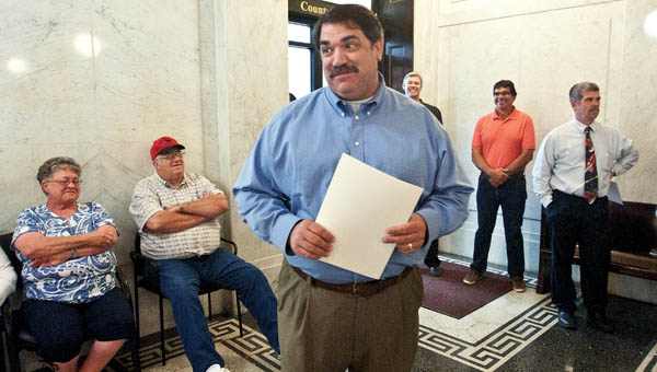 Lawrence County Engineers Doug Cade says his thank yous and good byes during a retirement party Wednesday at the Lawrence County Courthouse.