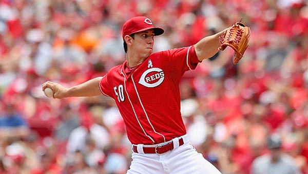 Cincinnati starting pitcher Michael Lorezen was sick but still threw seven innings of two-run baseball as the Reds beat the Miami Marlins 5-2 on Sunday. Lorenzen was pitching in a MLB game for the first time with his father watching. (Courtesy of The Cincinnati Reds.com)