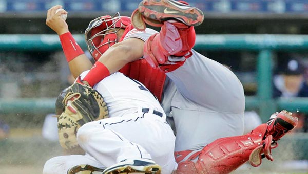 Cincinnati Reds’ catcher Brayan Pena tags out Detroit Tigers’ Anthony Gose as he tried to score from second base during the fifth inning of Tuesday’s game. The Reds beat the Tigers 5-2 as Todd Frazier hit two home runs. (Courtesy of The Cincinnati Reds.com)