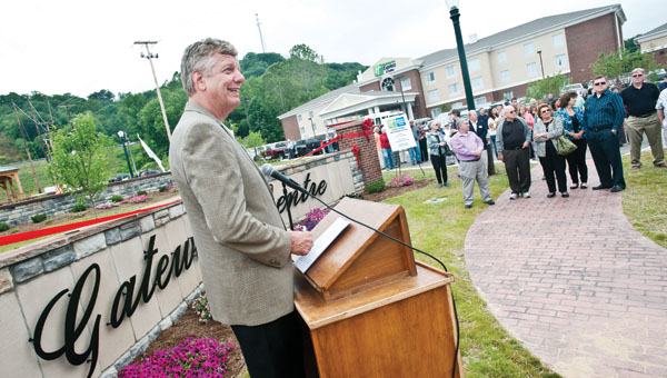 Mike Holtz, representative with Holiday Inn Express and Suites, speaks to the crowd during the Gateway Centre Dedication Tuesday in Ironton.