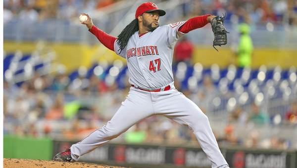 Cincinnati Reds pitcher Johnny Cueto throws against the Miami Marlins during the third inning on Sunday. Cueto lost his temper after being taken from the game in the sixth inning. (MCT Direct Photo)