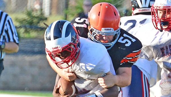 Ironton Fighting Tigers’ linebacker Josh Allen (51) wraps up a Columbus Eastmoor runner during last Saturday’s Jamboree Game. Ironton hosts Wheelersburg at 7:30 p.m. Friday in the season opener. (Kent Sanborn of Southern Ohio Sports Photos)