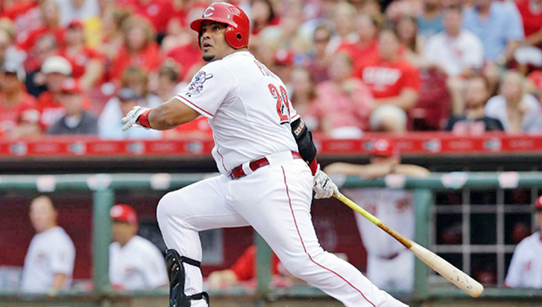Cincinnati Reds’ Brayan Pena doubles home two runs in the third inning of Wednesday’s game against the St. Louis Cardinals. The Cardinals beat the Reds 4-3 in 13 innings. (Courtesy of The Cincinnati Reds.com)