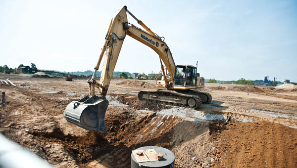 Workers are on scene along South Third Street as they clean up the grounds in the hope for future development.