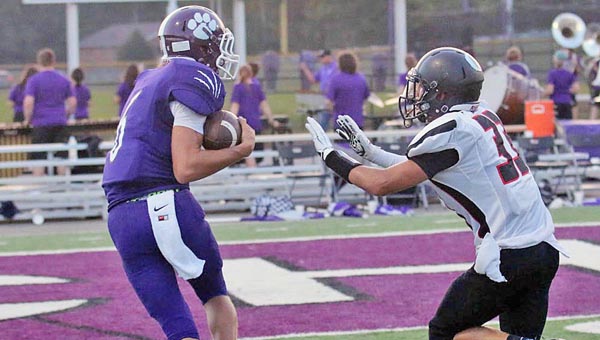 Chesapeake Panthers’ Austin Browning (left) hauls in a pass during a game earlier this season against Oak Hill. The Panthers visit backyard rival Symmes Valley on Friday. (Tim Gearhart of Tim’s News & Novelties on Park Ave. in Ironton)