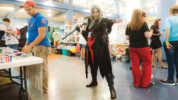 Mallory Grizzell is Lady Sephiroth from the Kingdom of Hearts making her way through the booths at the Highlanders Hero Con Saturday at the Highlands Museum and Discovery Center.