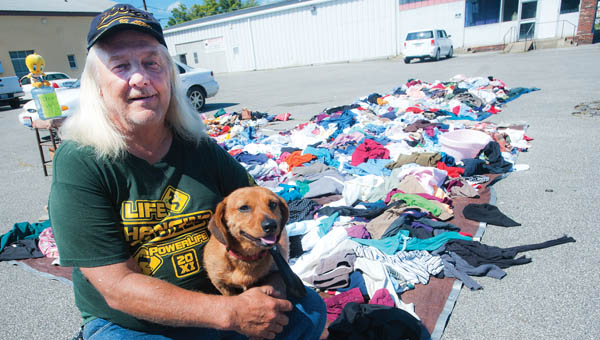 Cecil Oiler, of Raceland, Kentucky, and his dog Killer are on a mission to help anyone who is in need of clothes.