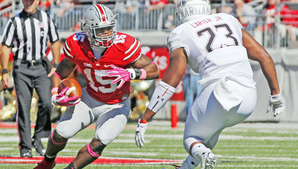 Ohio State running back Ezekiel Elliott (15) says the Buckeyes are staying focused even during this week's bye in the schedule. (Barbara J. Perenic/Columbus Dispatch/TNS)