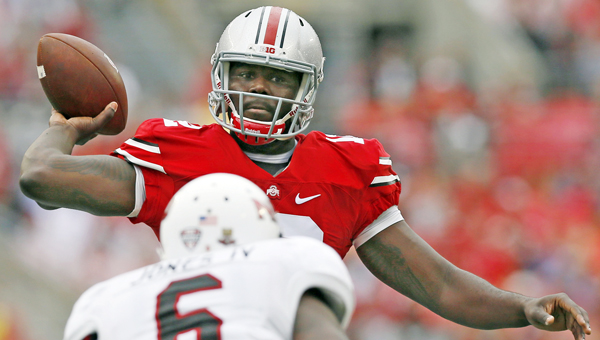 Ohio State quarterback Cardale Jones throws a pass over Northern Illinois linebacker Bobby Jones IV (6) during the first quarter at Ohio Stadium last Saturday. (MCT Direct Photos)