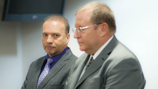 Lawrence County Commissioner Les Boggs and his attorney Scott Evans before the start of Ironton Municipal Court on Thursday.