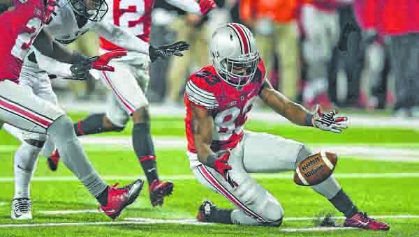 Ohio State Buckeyes’ Terry McLaurin (83) makes a fumble recovery during last week’s game against Michigan State. The Buckeyes visit rival Michigan on Saturday. (Kyle Robertson/Columbus Dispatch/TNS/MCT Direct)