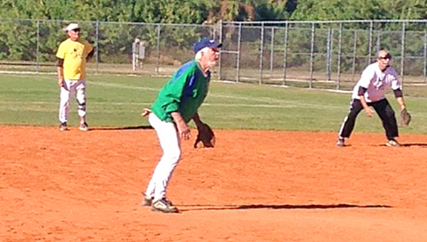 Ironton's Herm Zornes, 82 years old, gets ready to field after making a pitch in a senior’s softball game. Zornes has been nominated for the National Seniors Softball Hall of Fame. (Photo Submitted)